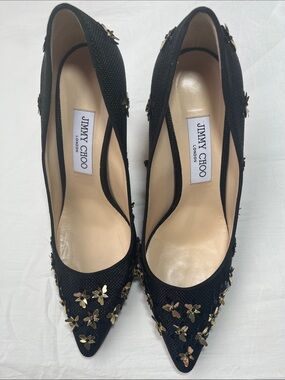 Jimmy Choo Black Pointed-Toe Pumps with Gold Floral Embellishments